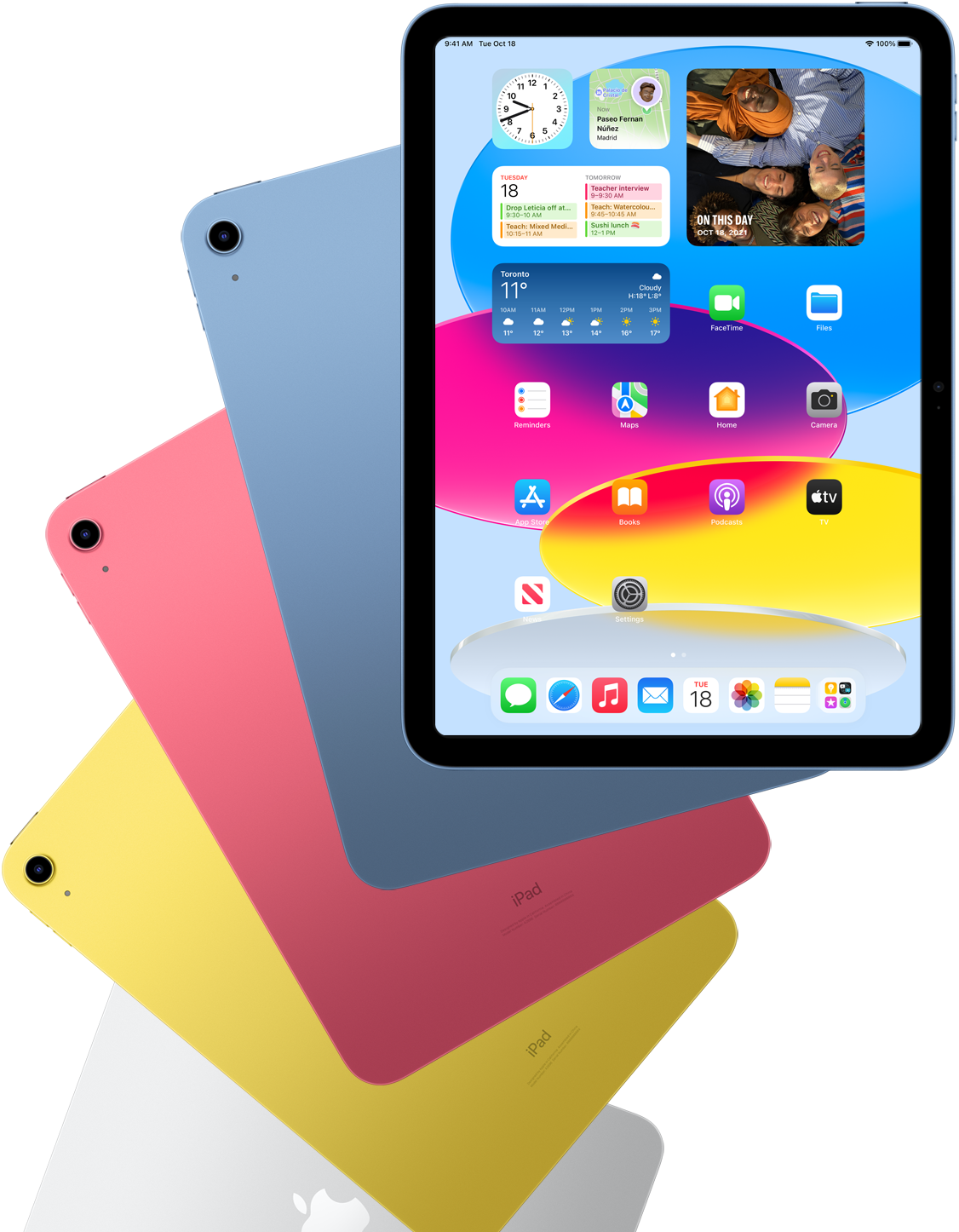 Front view iPad shows home screen with blue, pink, yellow and silver rear facing iPads behind it.